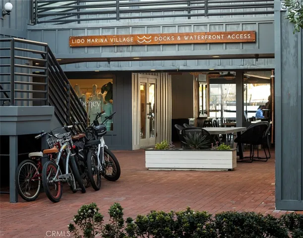 a living room with furniture and a lamp