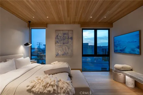 a bedroom with a bed and a gate