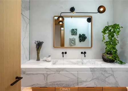 a vase of flowers sitting on a floor