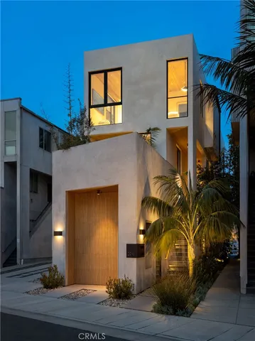 a city street filled with lots of traffic and trees