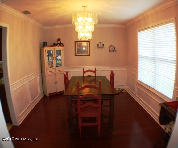 54178 Snyder Road Callahan, FL 32011 - Photo 5 of 14 a view of a dining room with furniture and window