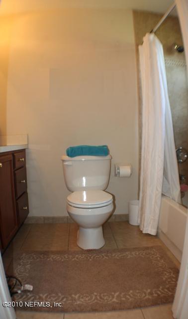 54178 Snyder Road Callahan, FL 32011 - Photo 7 of 14 a white toilet sitting next to a sink