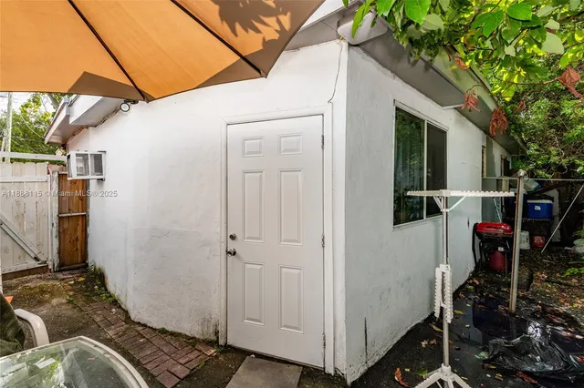a backyard of a house with seating space