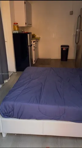 a view of backyard with wooden stairs