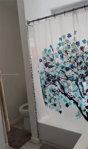 an aerial view of residential building with outdoor space