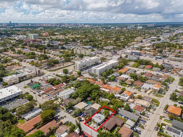 an aerial view of residential building with parking space