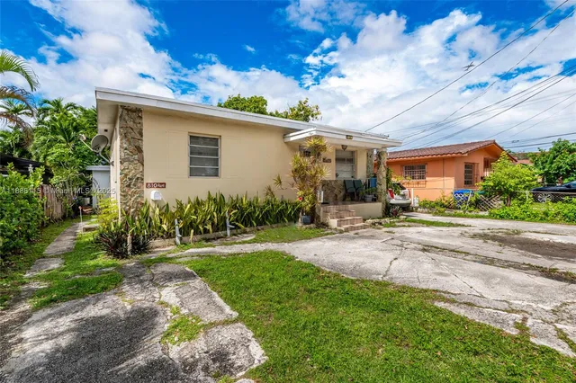 a front view of a house with patio