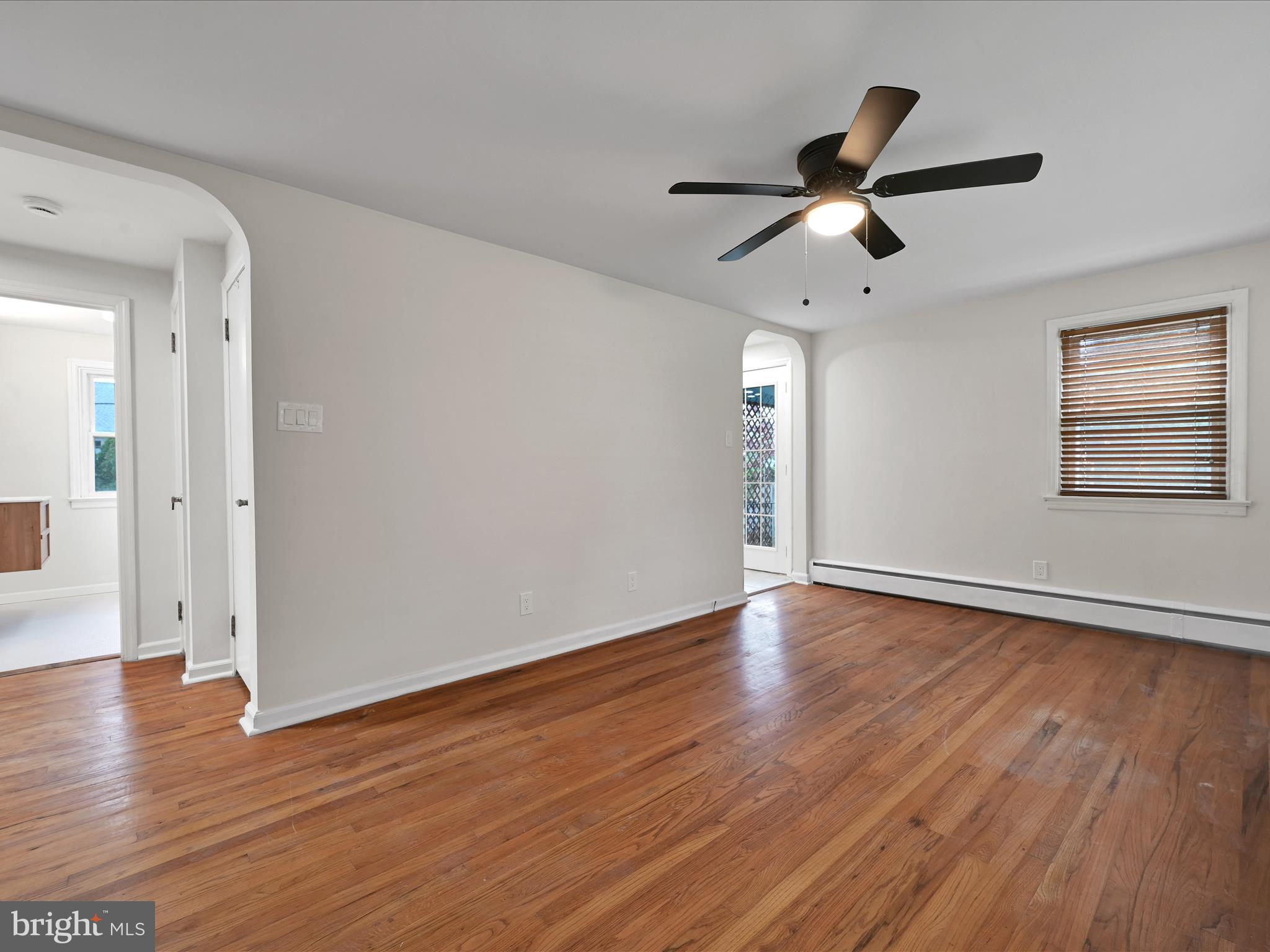 1609 Fayette Avenue Reading, PA 19607 - Photo 11 of 27 a view of empty room with wooden floor and ceiling fan