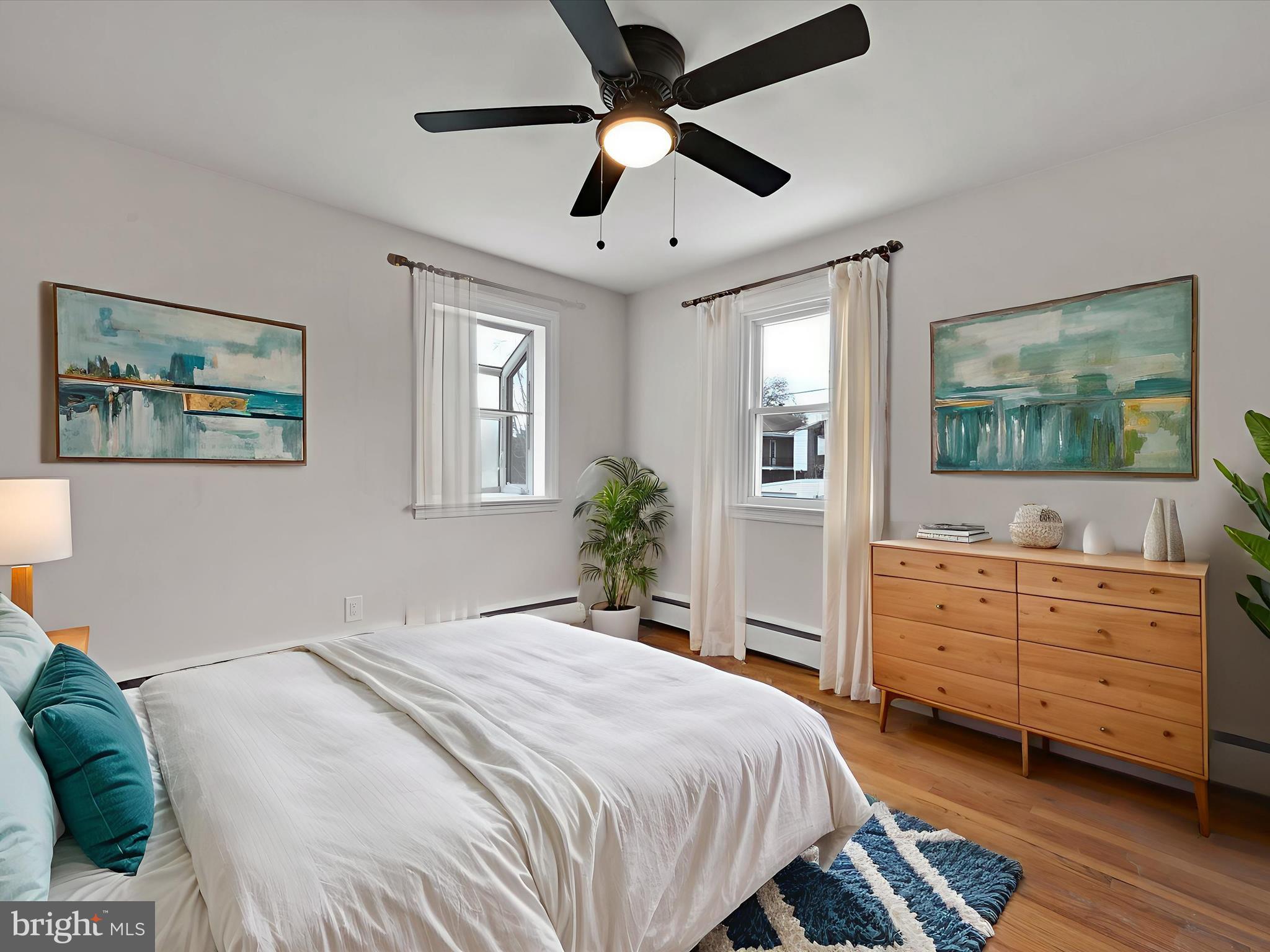 1609 Fayette Avenue Reading, PA 19607 - Photo 22 of 27 a bedroom with a large bed and a dresser
