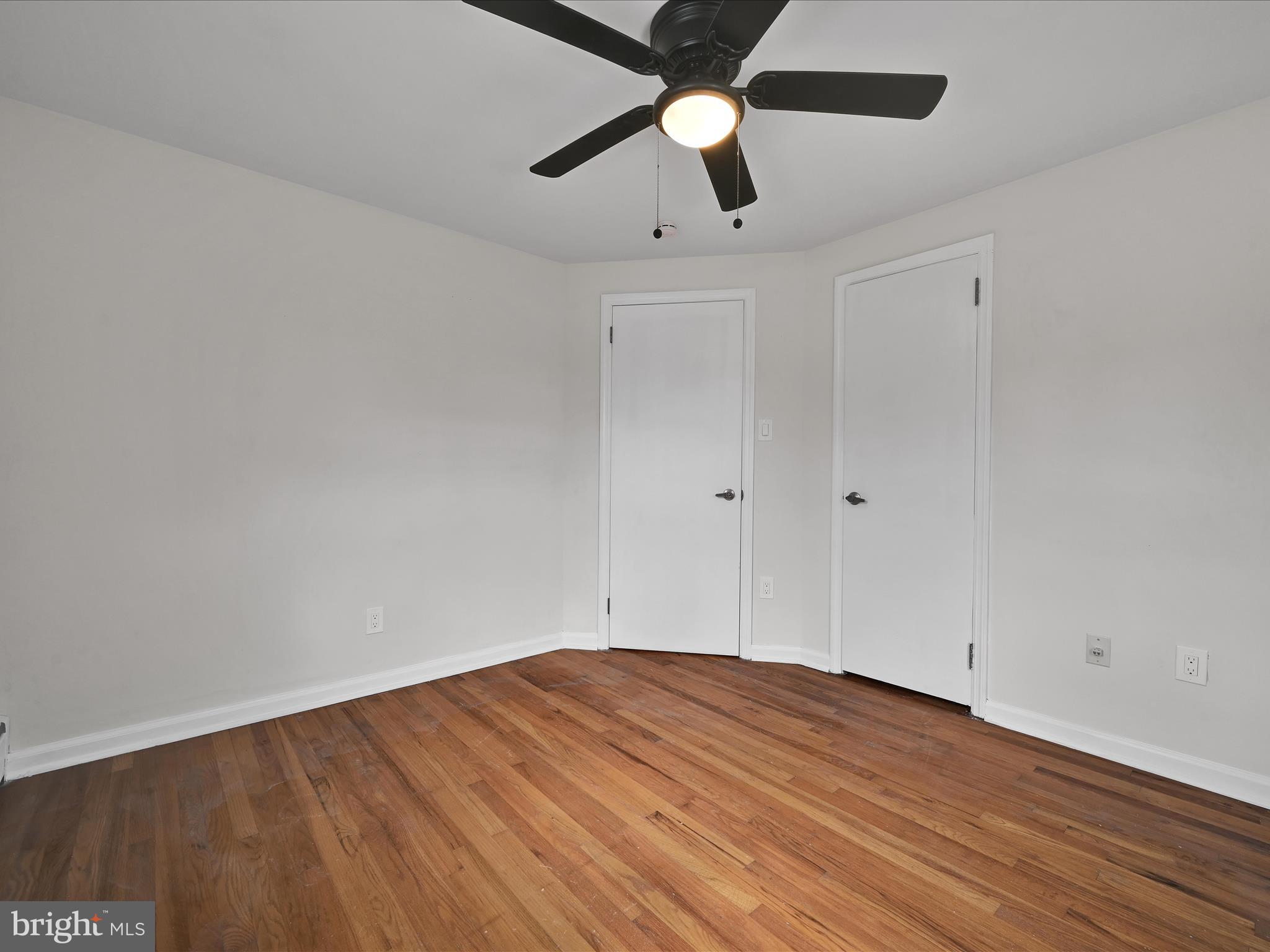 1609 Fayette Avenue Reading, PA 19607 - Photo 24 of 27 a view of empty room with wooden floor