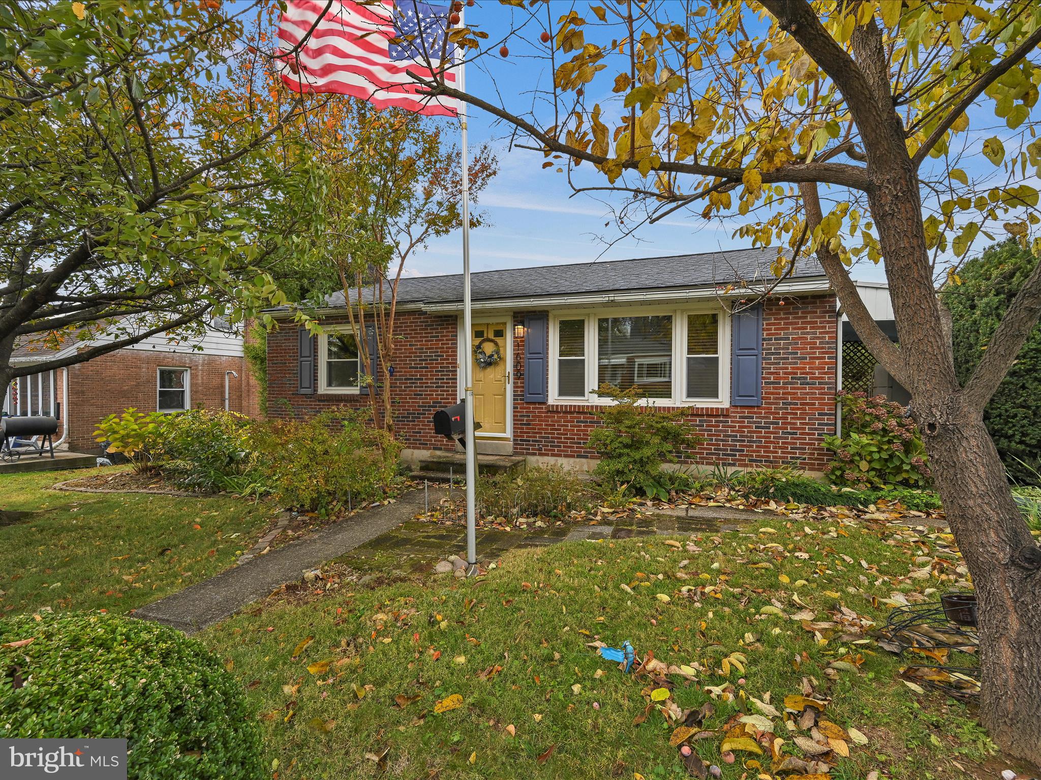 1609 Fayette Avenue Reading, PA 19607 - Photo 4 of 27 front view of a house with a yard