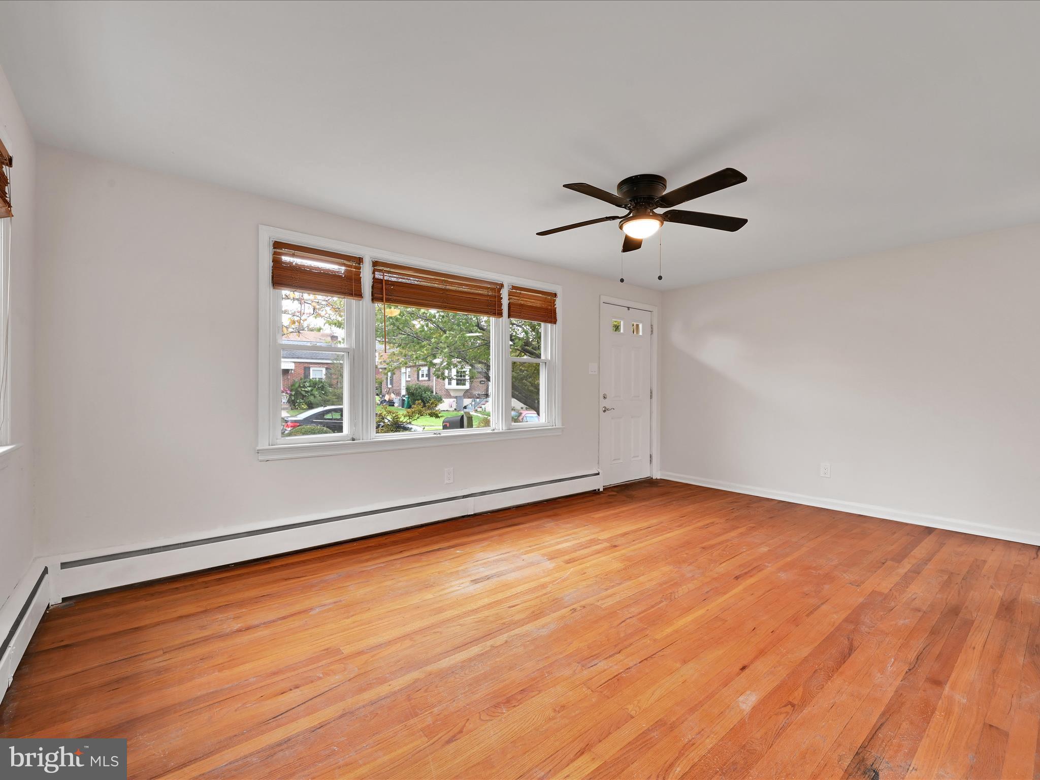 1609 Fayette Avenue Reading, PA 19607 - Photo 8 of 27 an empty room with window and a ceiling fan