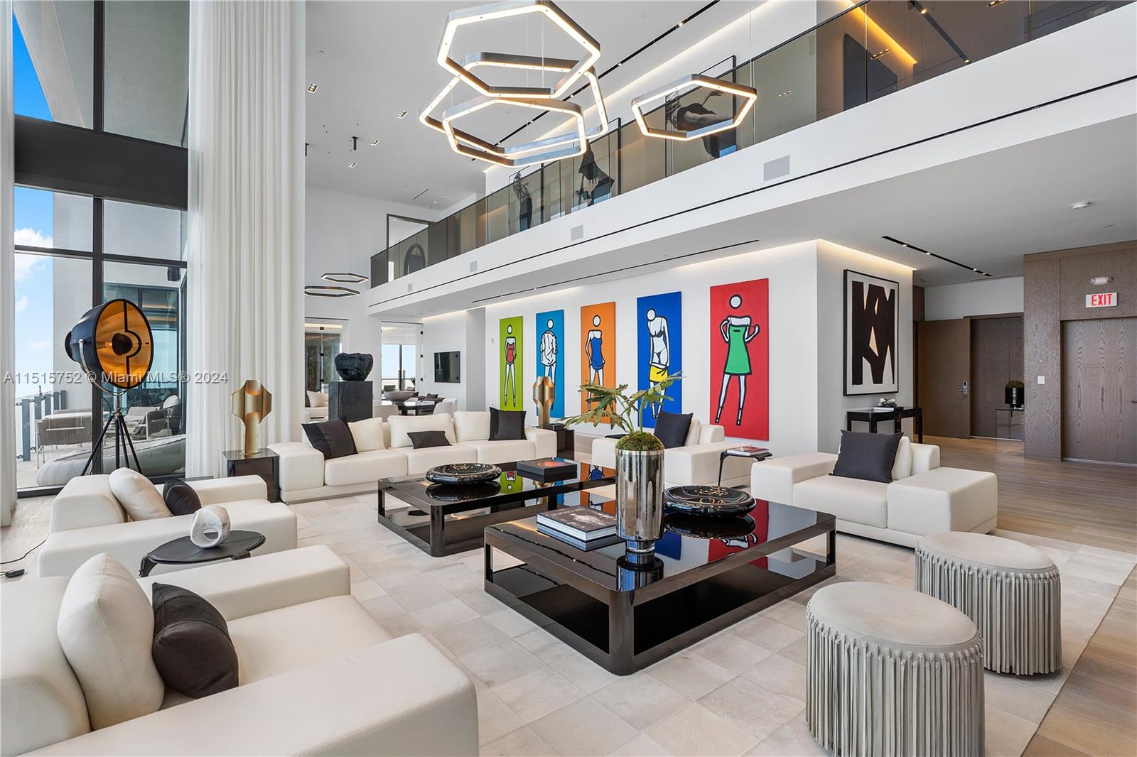 1451 Brickell Avenue, Unit PH56 Miami, FL 33131 - Photo 12 of 54 a living room with patio furniture and chandelier