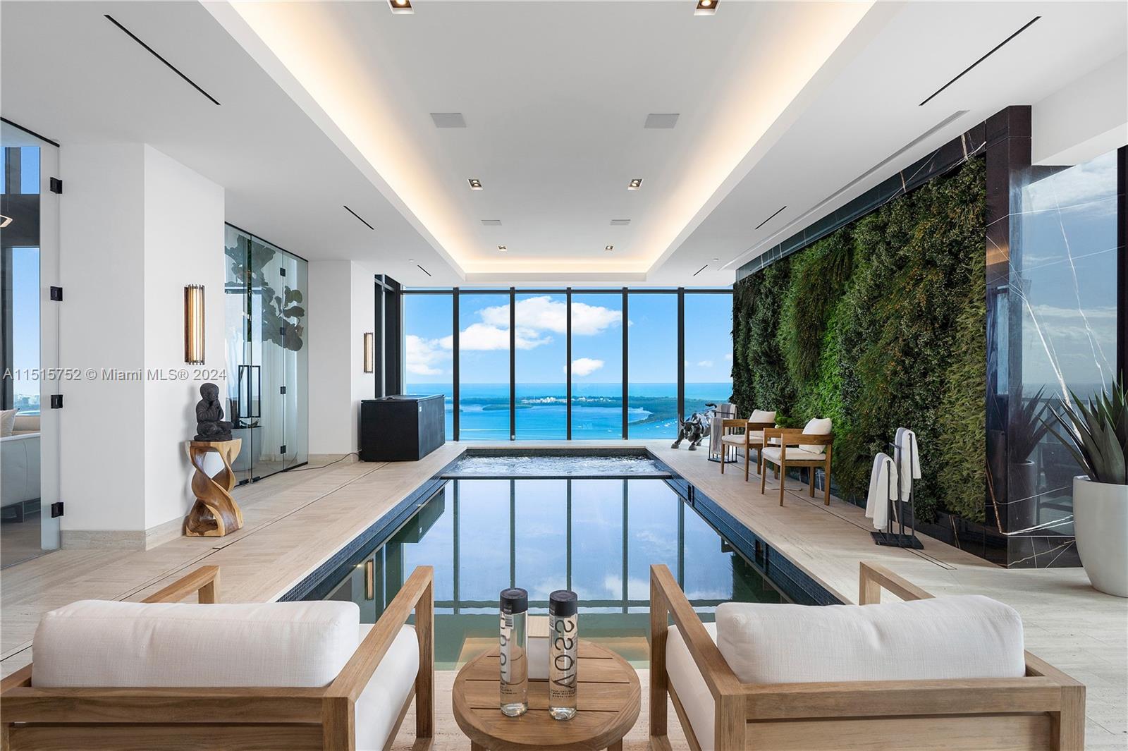 1451 Brickell Avenue, Unit PH56 Miami, FL 33131 - Photo 20 of 54 a view of a living room and dining room