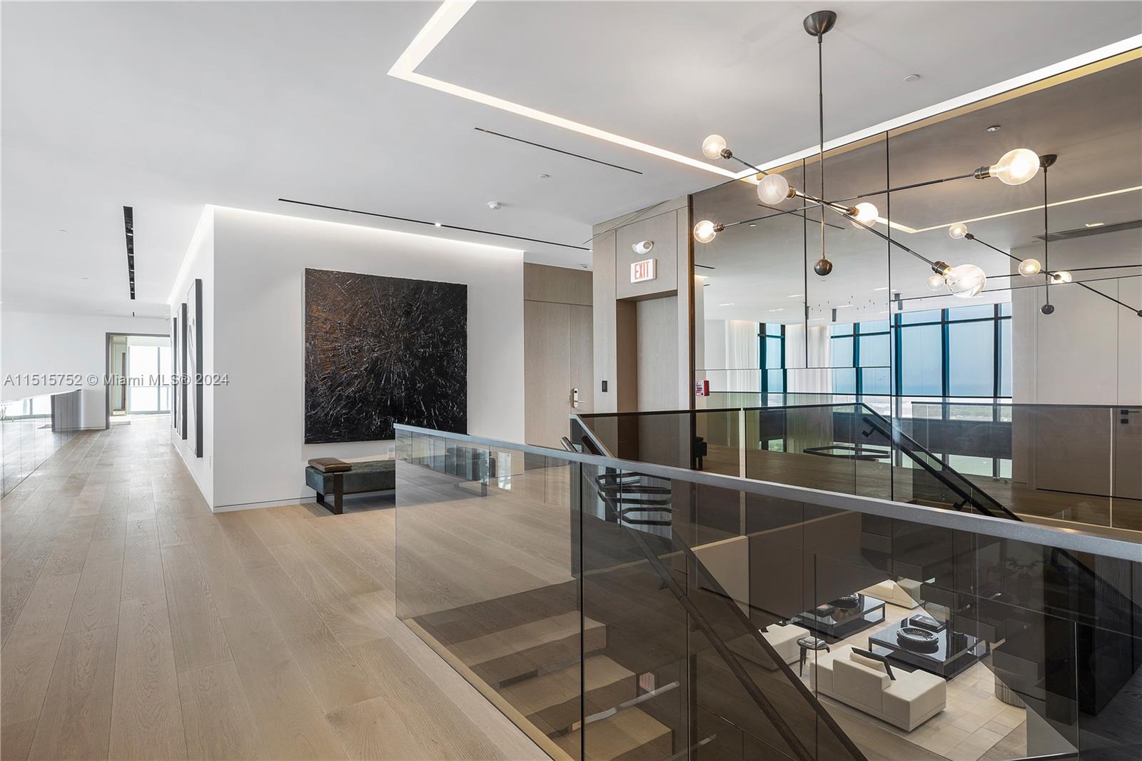 1451 Brickell Avenue, Unit PH56 Miami, FL 33131 - Photo 24 of 54 a lobby with furniture and floor to ceiling window