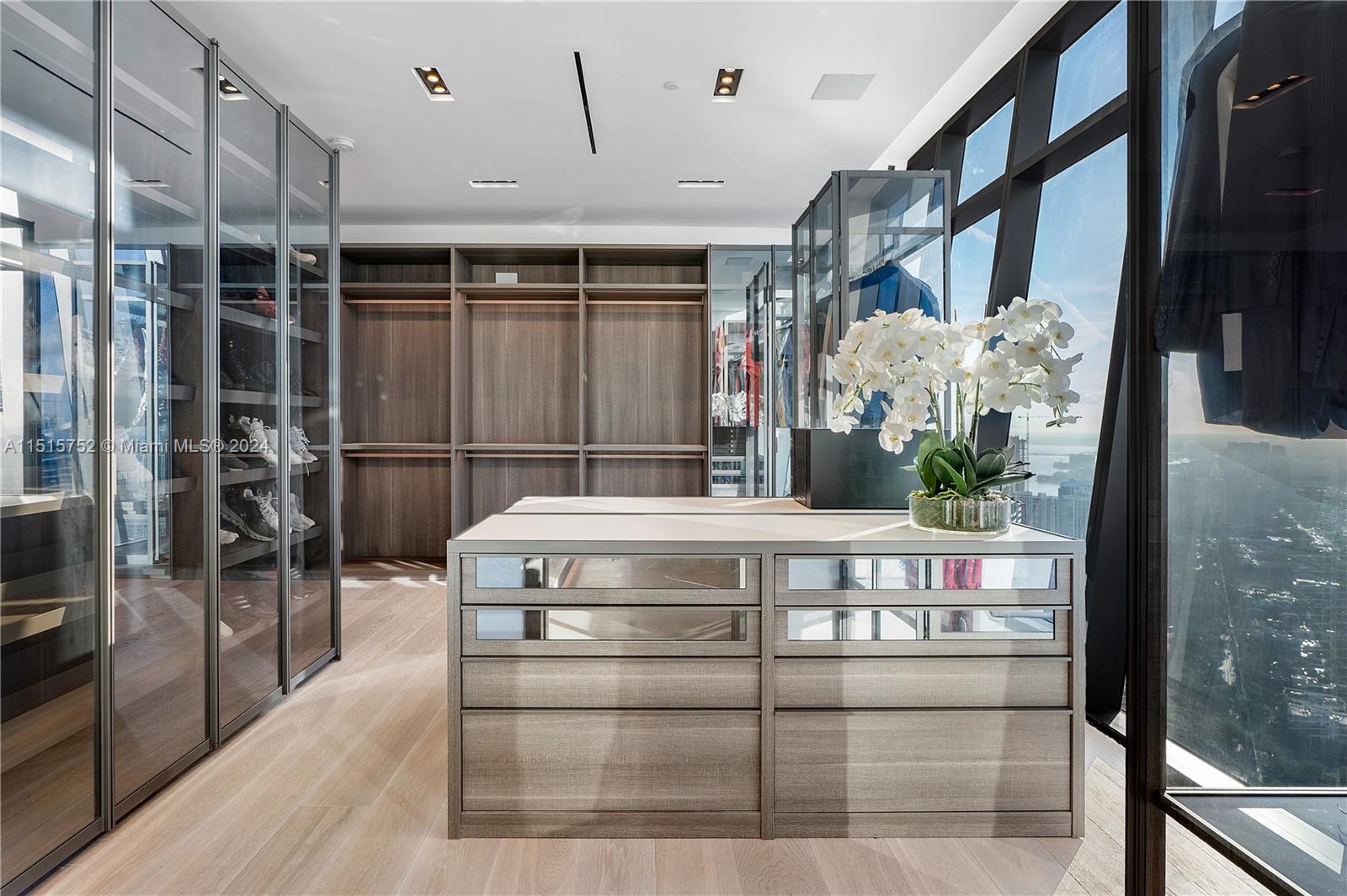 1451 Brickell Avenue, Unit PH56 Miami, FL 33131 - Photo 30 of 54 a kitchen with appliances and cabinets