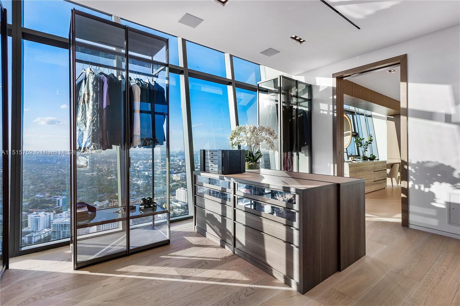 1451 Brickell Avenue, Unit PH56 Miami, FL 33131 - Photo 31 of 54 a kitchen with stainless steel appliances granite countertop a stove and a refrigerator