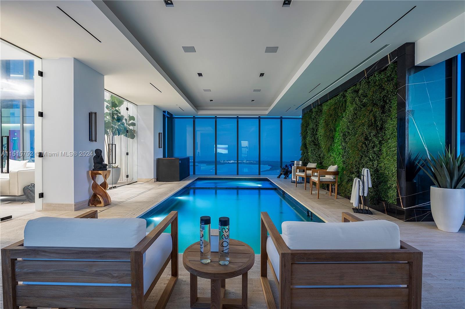 1451 Brickell Avenue, Unit PH56 Miami, FL 33131 - Photo 41 of 54 a living room with furniture pool table chairs and windows