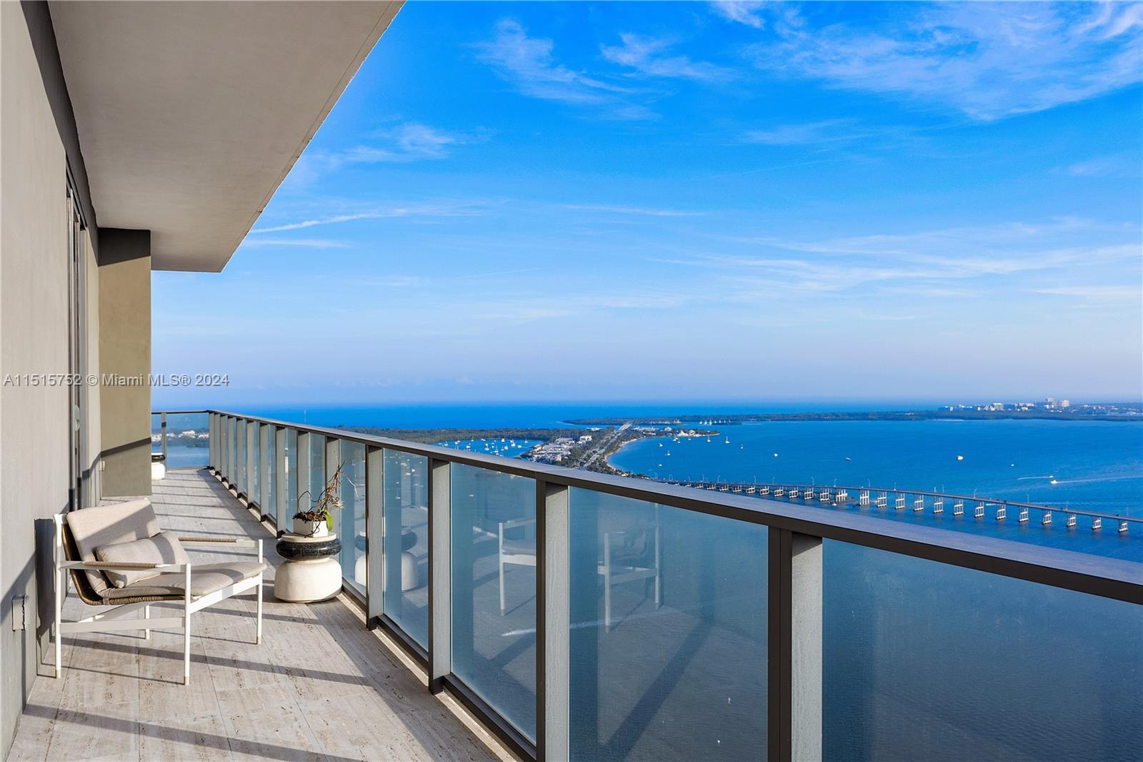 1451 Brickell Avenue, Unit PH56 Miami, FL 33131 - Photo 42 of 54 a view of balcony with wooden floor and city view