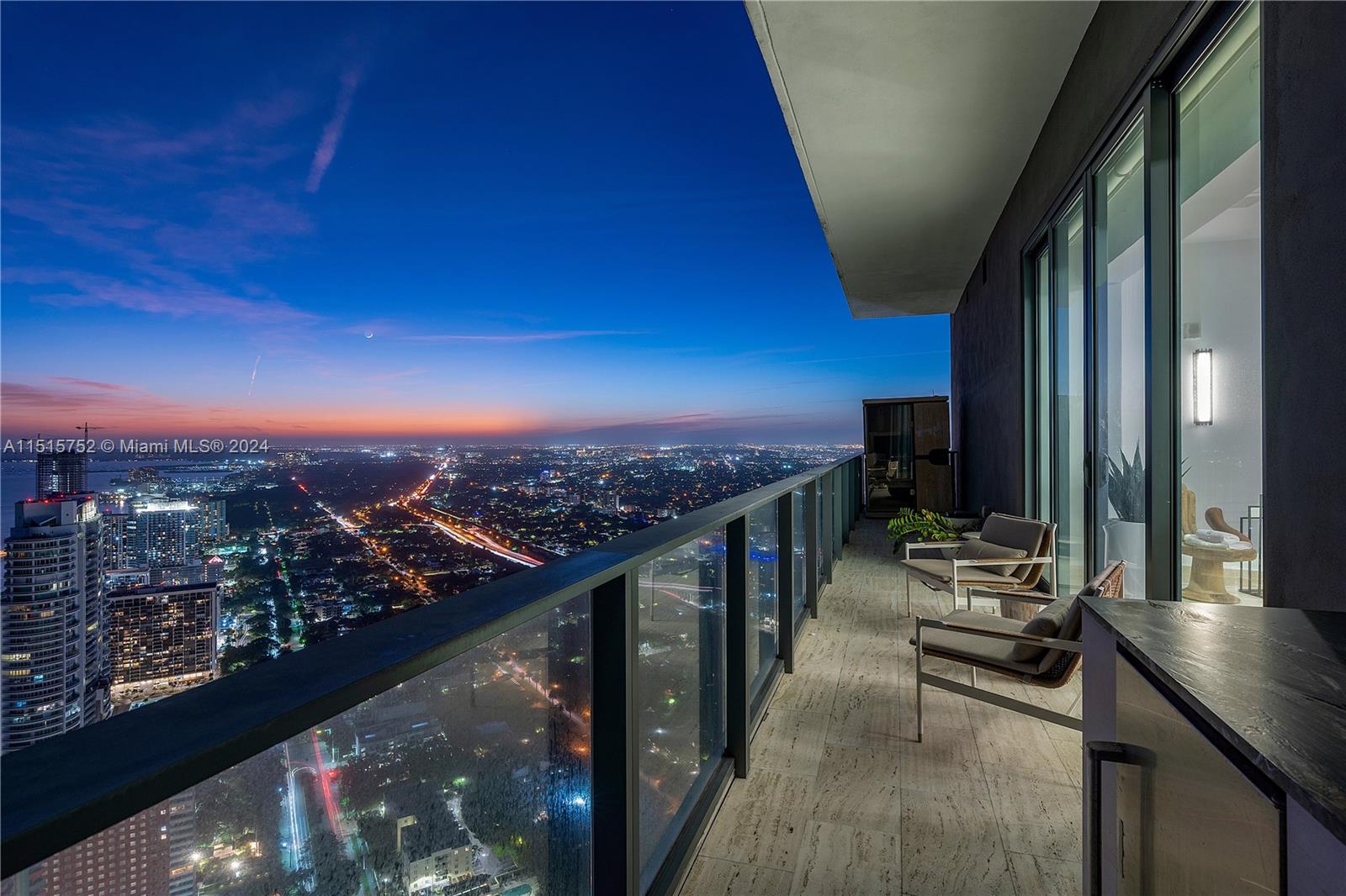 1451 Brickell Avenue, Unit PH56 Miami, FL 33131 - Photo 45 of 54 a view of city from balcony