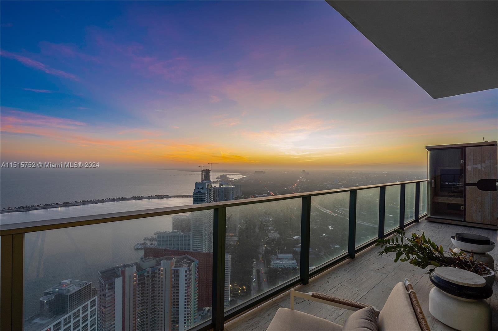 1451 Brickell Avenue, Unit PH56 Miami, FL 33131 - Photo 46 of 54 a view of a balcony with chair and city view
