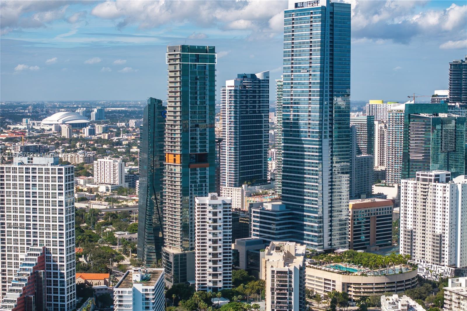 1451 Brickell Avenue, Unit PH56 Miami, FL 33131 - Photo 53 of 54 a city view with tall buildings