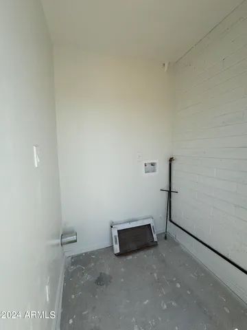 a view of a room with an empty space