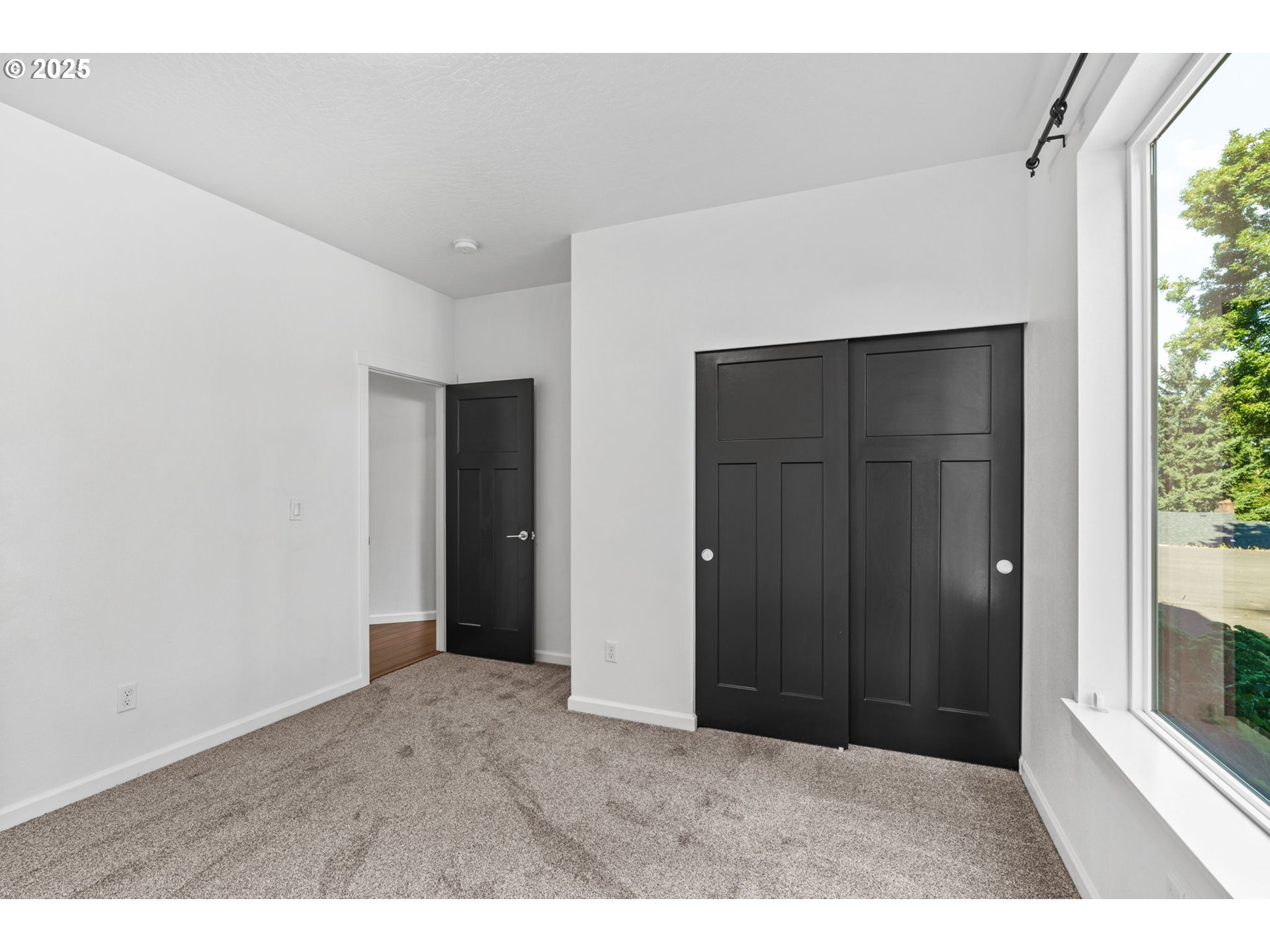 2187 East Madison Avenue Cottage Grove, OR 97424 - Photo 20 of 41 a view of an empty room with a window