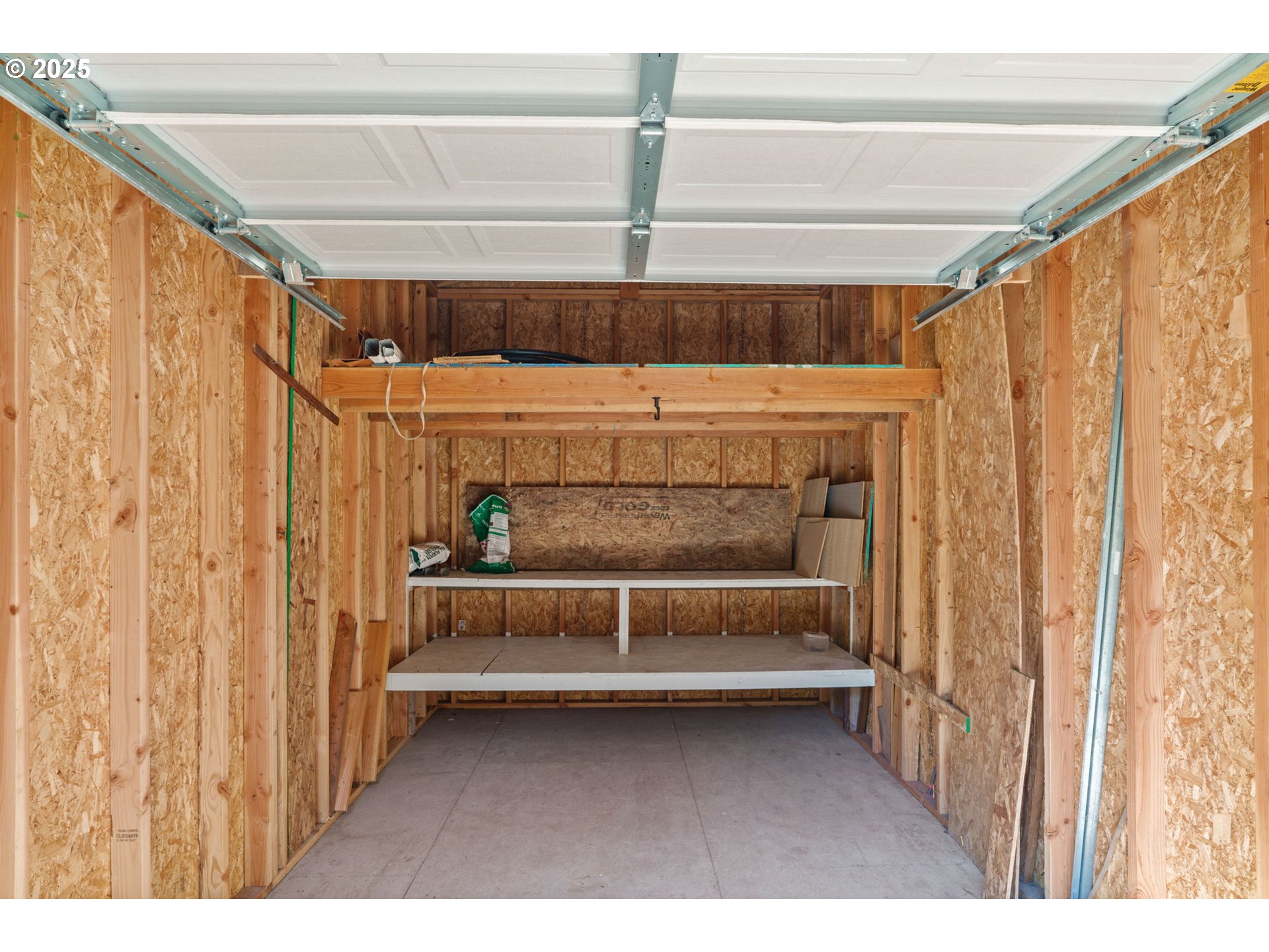 2187 East Madison Avenue Cottage Grove, OR 97424 - Photo 27 of 41 a view of a room with racks on the wall