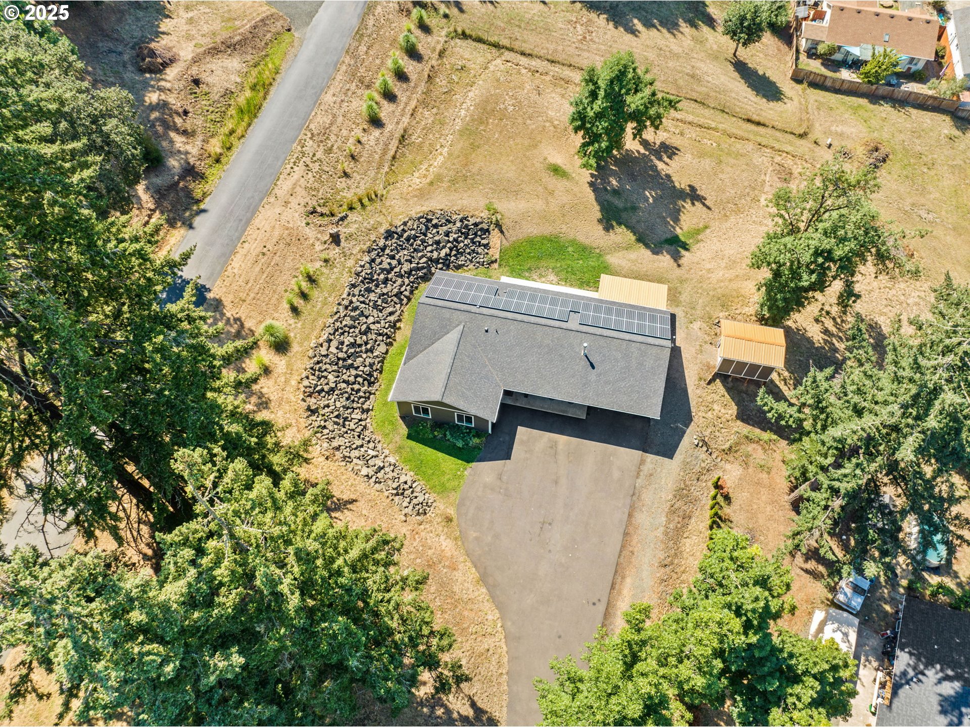 2187 East Madison Avenue Cottage Grove, OR 97424 - Photo 40 of 41 view of a house with a yard