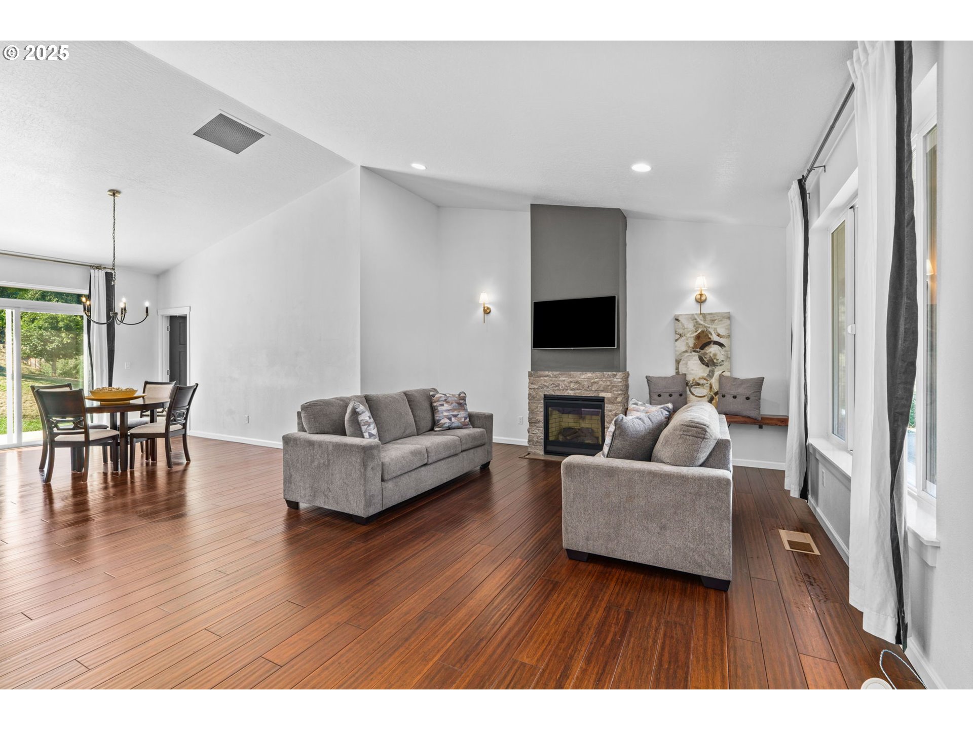 2187 East Madison Avenue Cottage Grove, OR 97424 - Photo 5 of 41 a living room with furniture and a flat screen tv