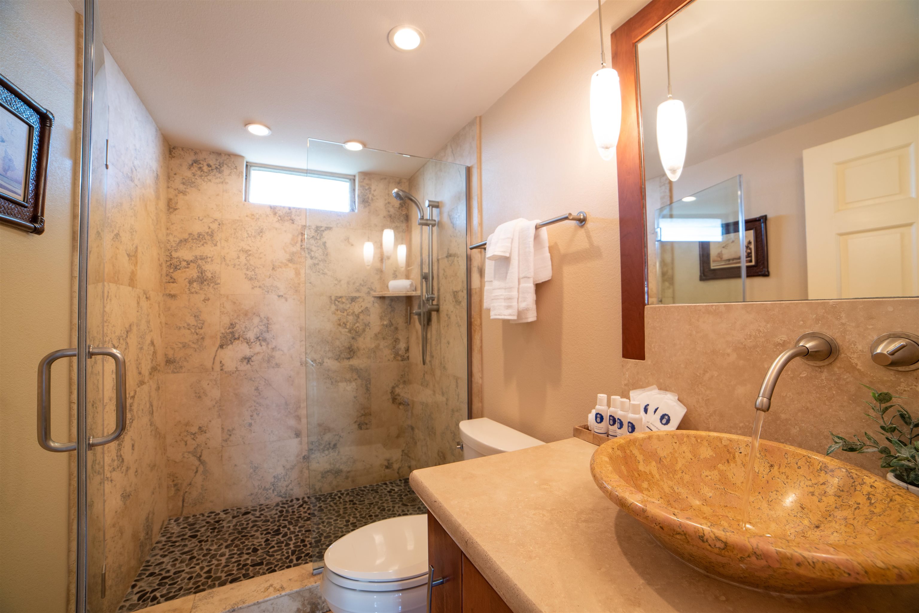 73 North Kihei Road, Unit 308 Kihei, HI 96753 - Photo 20 of 23 a bathroom with a sink toilet and shower