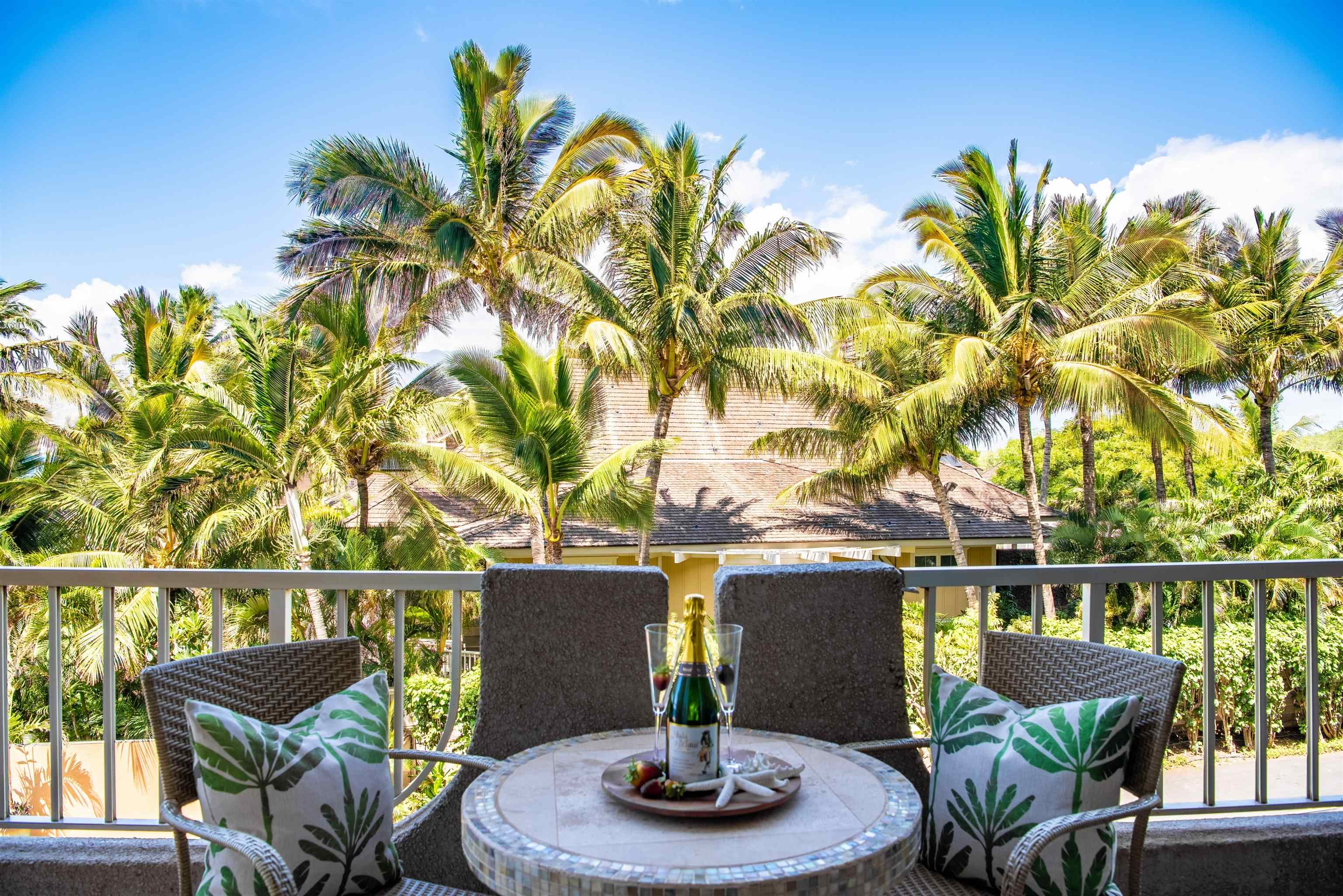 73 North Kihei Road, Unit 308 Kihei, HI 96753 - Photo 7 of 23 a balcony with table and chairs
