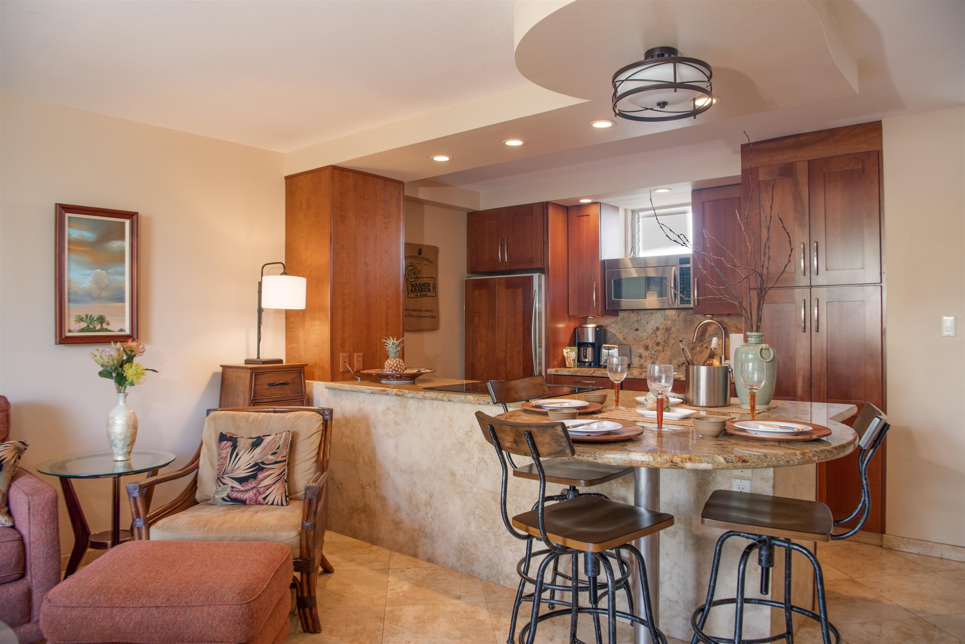 73 North Kihei Road, Unit 308 Kihei, HI 96753 - Photo 9 of 23 a view of a dining room with furniture window and wooden floor