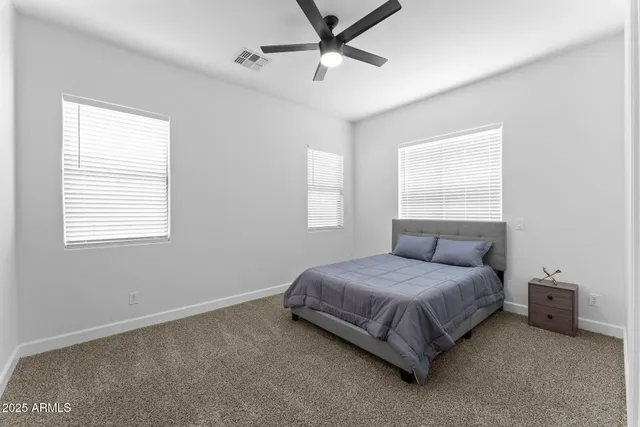 a bathroom with a shower and a toilet