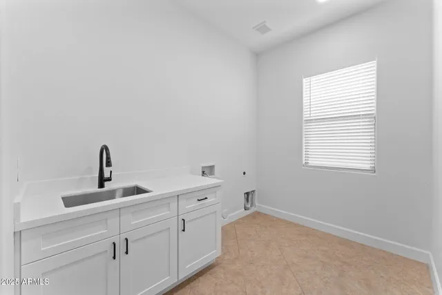 a bedroom with a bed and a ceiling fan