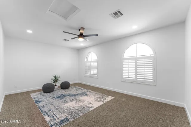 a bathroom with a double vanity sink and mirror