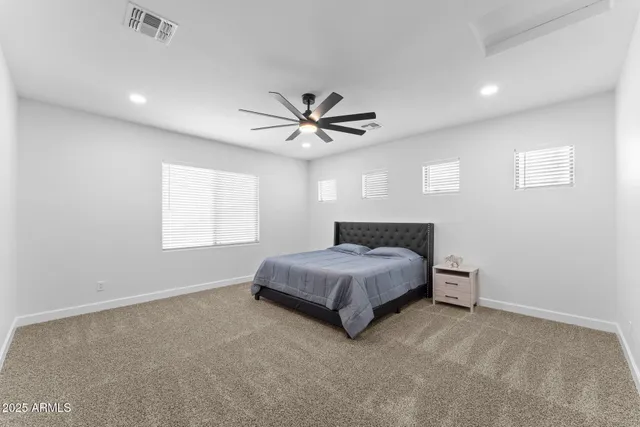 a white bath tub sitting in a bathroom