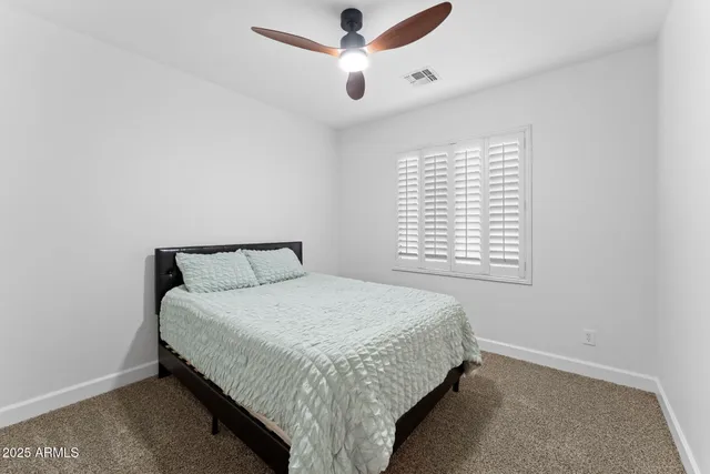 a view of backyard of a house