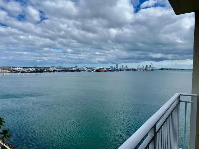 a view of a lake from a balcony