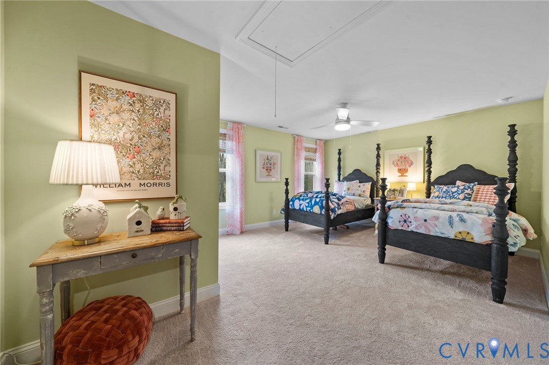 3954 Robins Ridge Drive Moseley, VA 23120 - Photo 16 of 20 a bedroom with furniture and a lamp