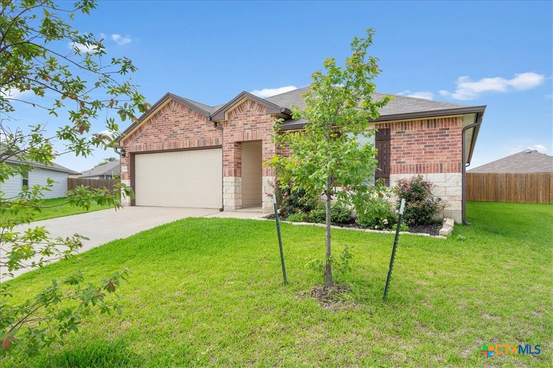1000 Velvet Court Troy, TX 76579 - Photo 3 of 25 a view of a house with a backyard