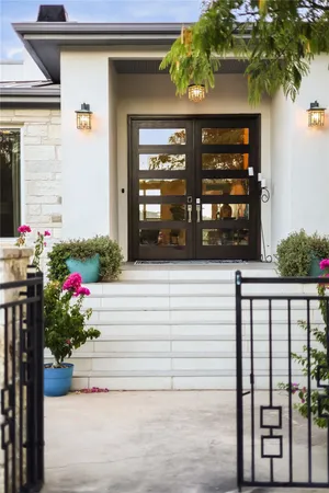 a front view of a house with outdoor space