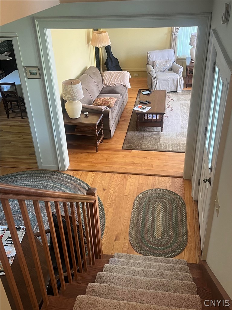 2778 Otisco Valley Road Marcellus, NY 13110 - Photo 29 of 44 A peek down the stairs into the spacious entry. Lo