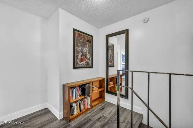 a way with wooden floor and stairs