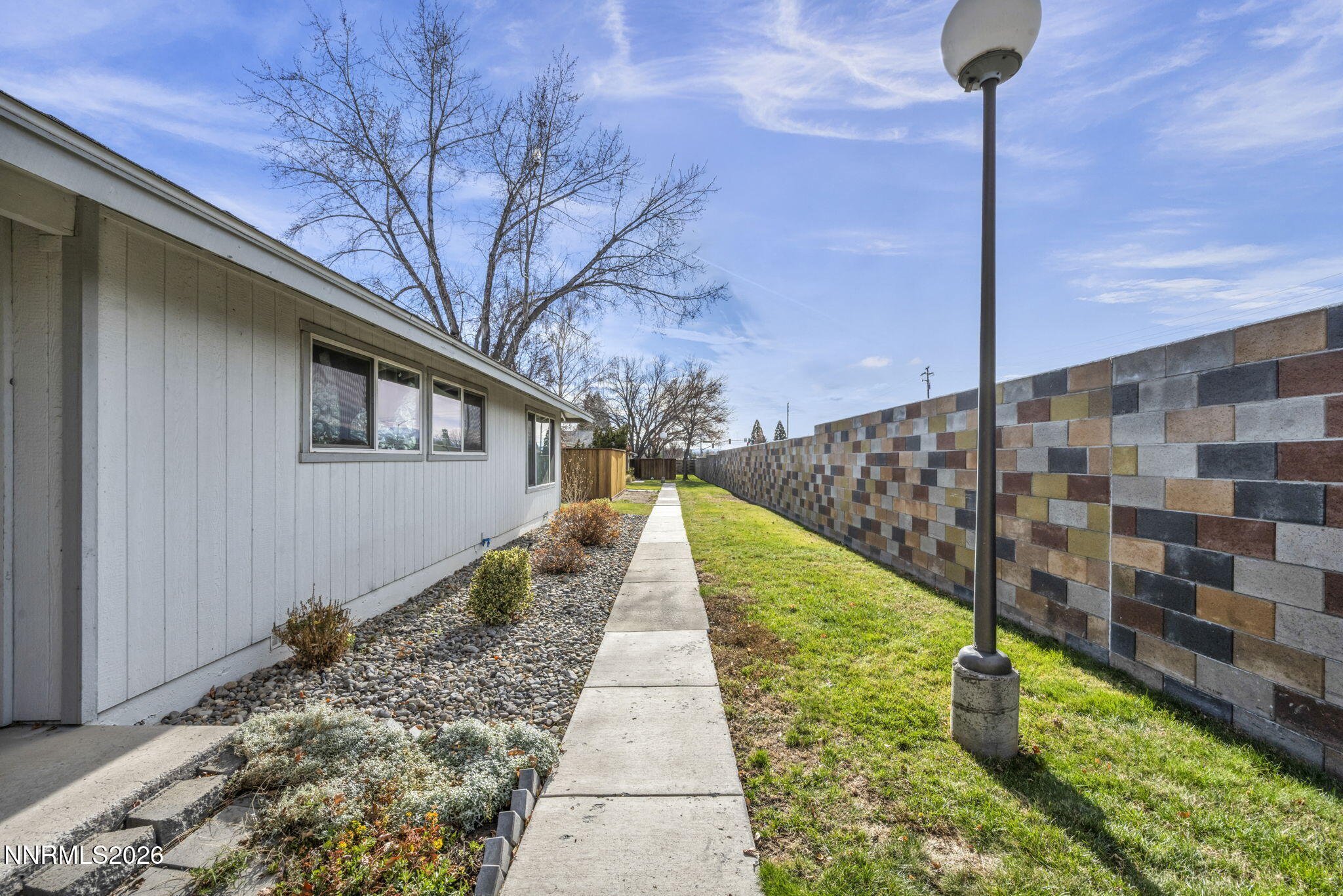 959 Mesa Ridge Drive, Unit 2 Sparks, NV 89434 - Photo 2 of 41 a view of swimming pool with a yard