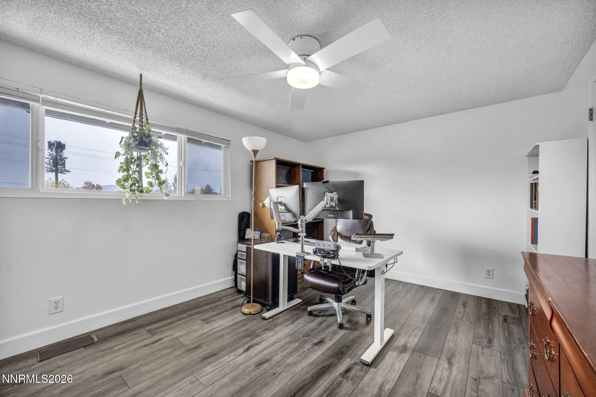 959 Mesa Ridge Drive, Unit 2 Sparks, NV 89434 - Photo 23 of 41 a view of a workspace with furniture and a window