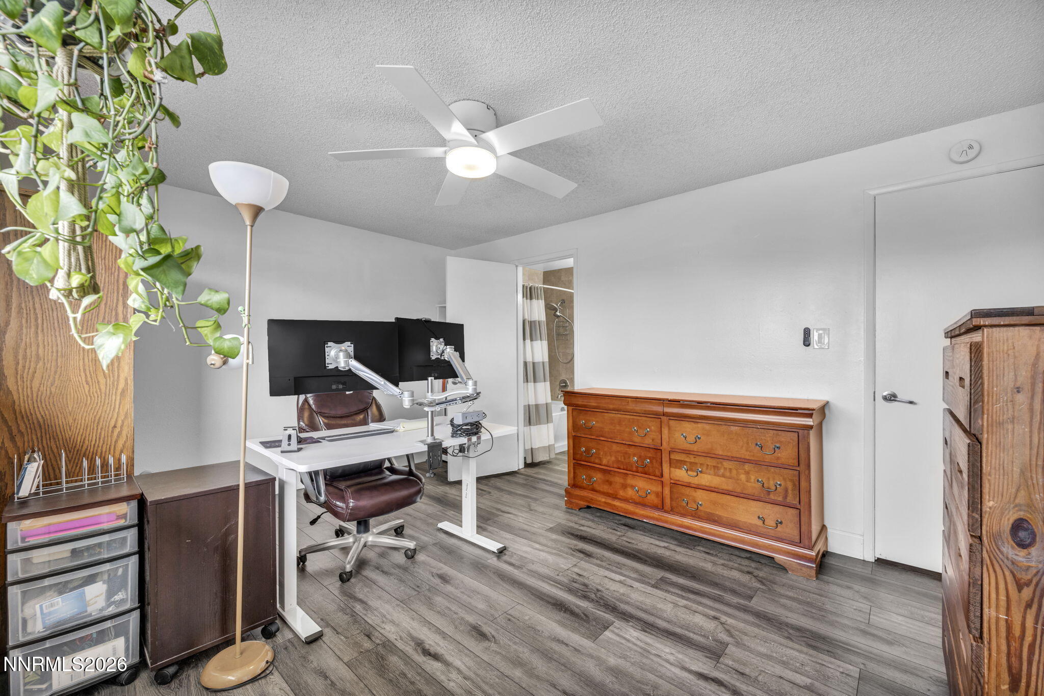 959 Mesa Ridge Drive, Unit 2 Sparks, NV 89434 - Photo 24 of 41 a workspace with furniture wooden floor and window
