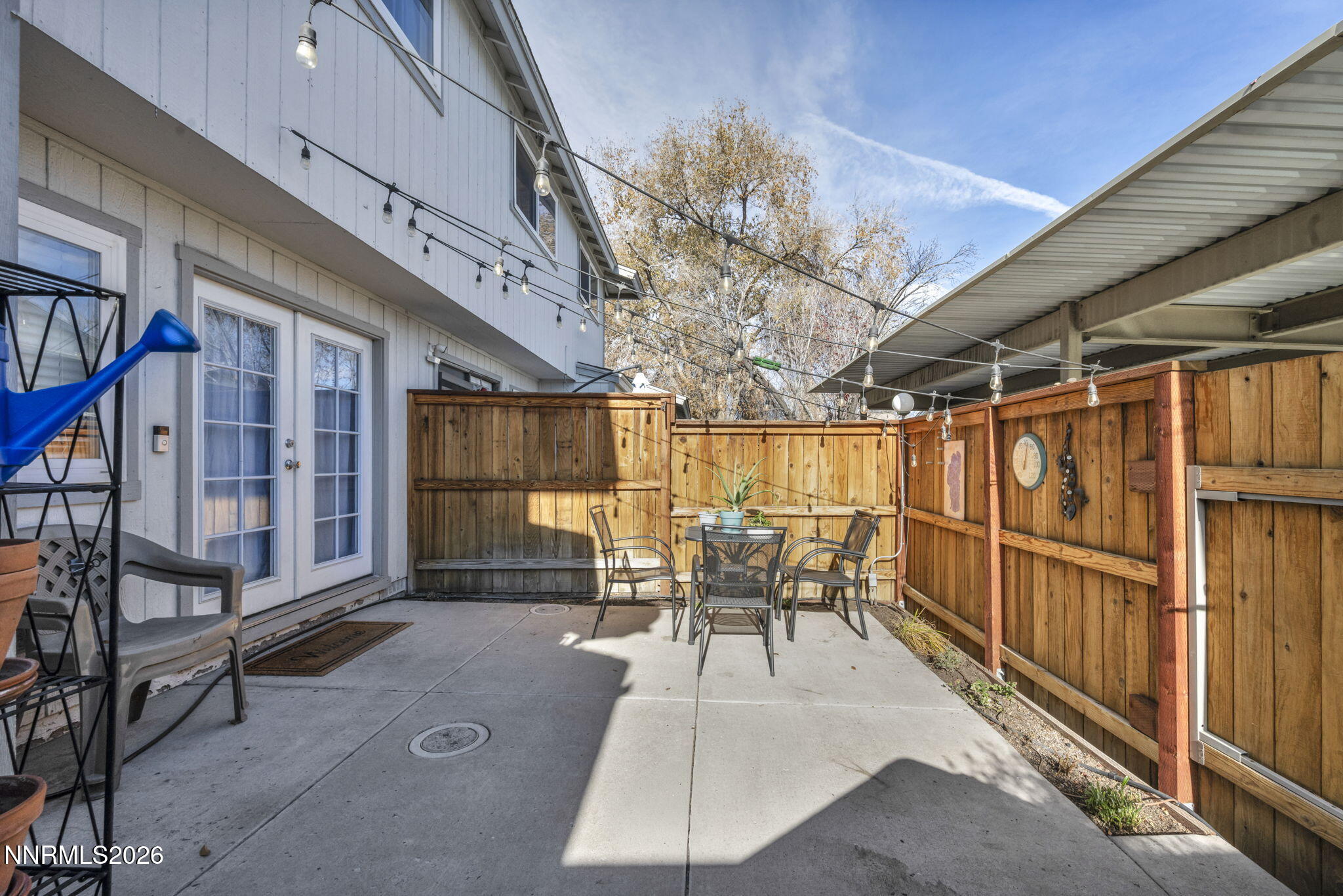 959 Mesa Ridge Drive, Unit 2 Sparks, NV 89434 - Photo 34 of 41 a view of a patio with table and chairs