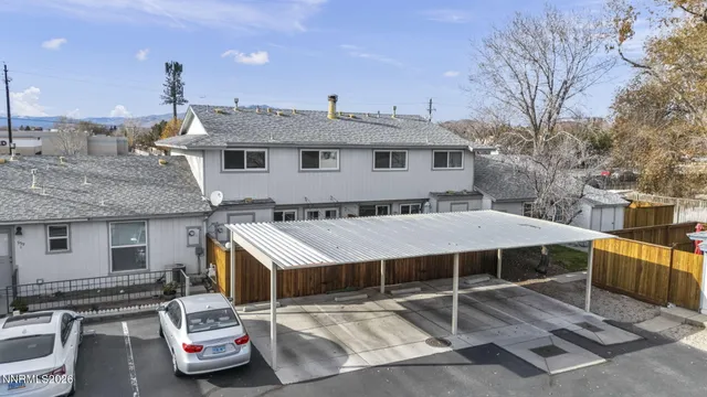 a aerial view of a house with parking space